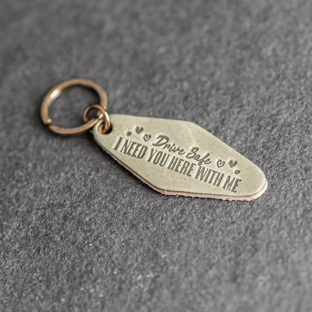 Leather Motel Key Shape Keychain with a Drive Safe Stamp Design