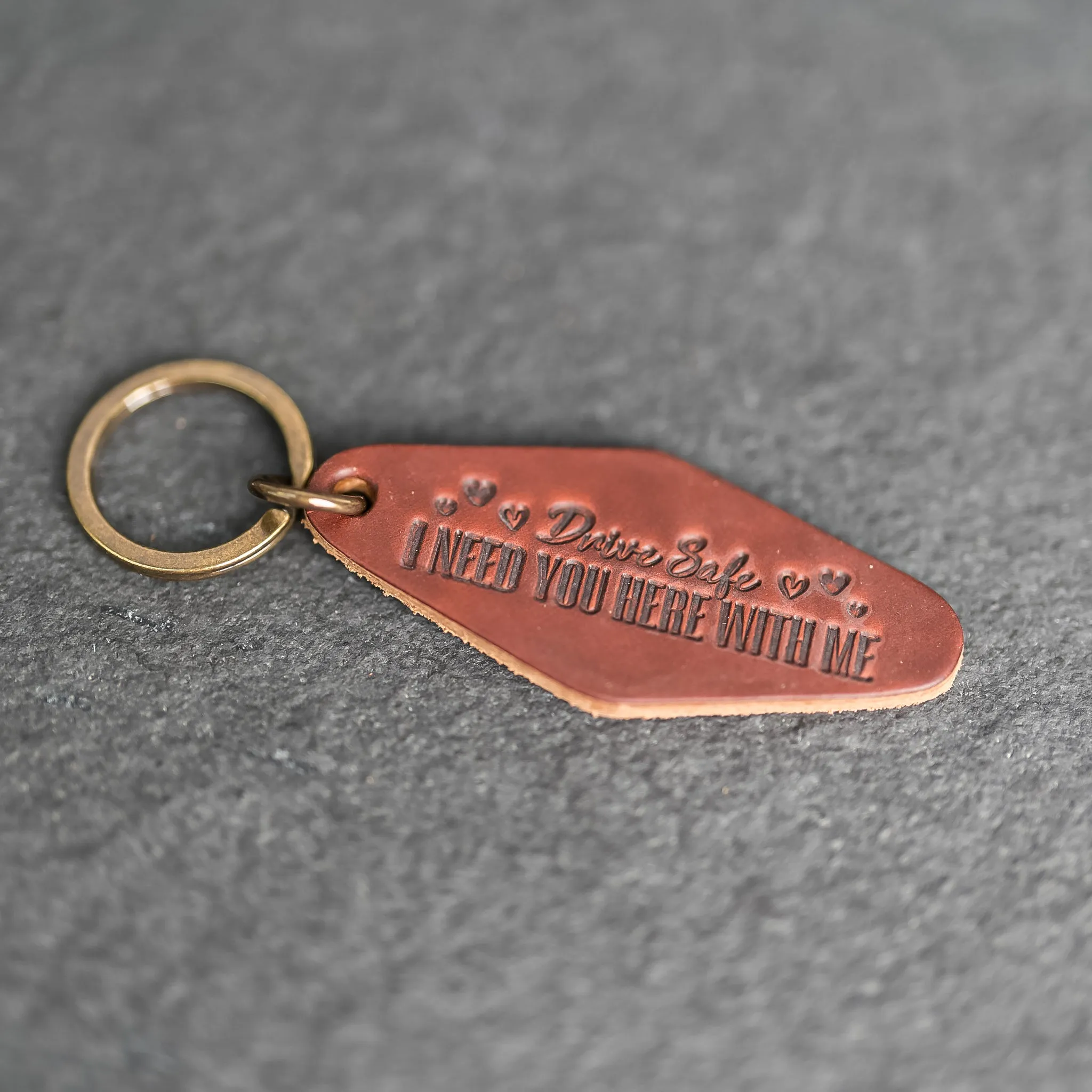 Leather Motel Key Shape Keychain with a Drive Safe Stamp Design