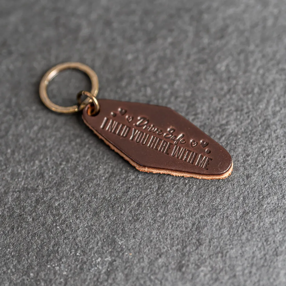 Leather Motel Key Shape Keychain with a Drive Safe Stamp Design