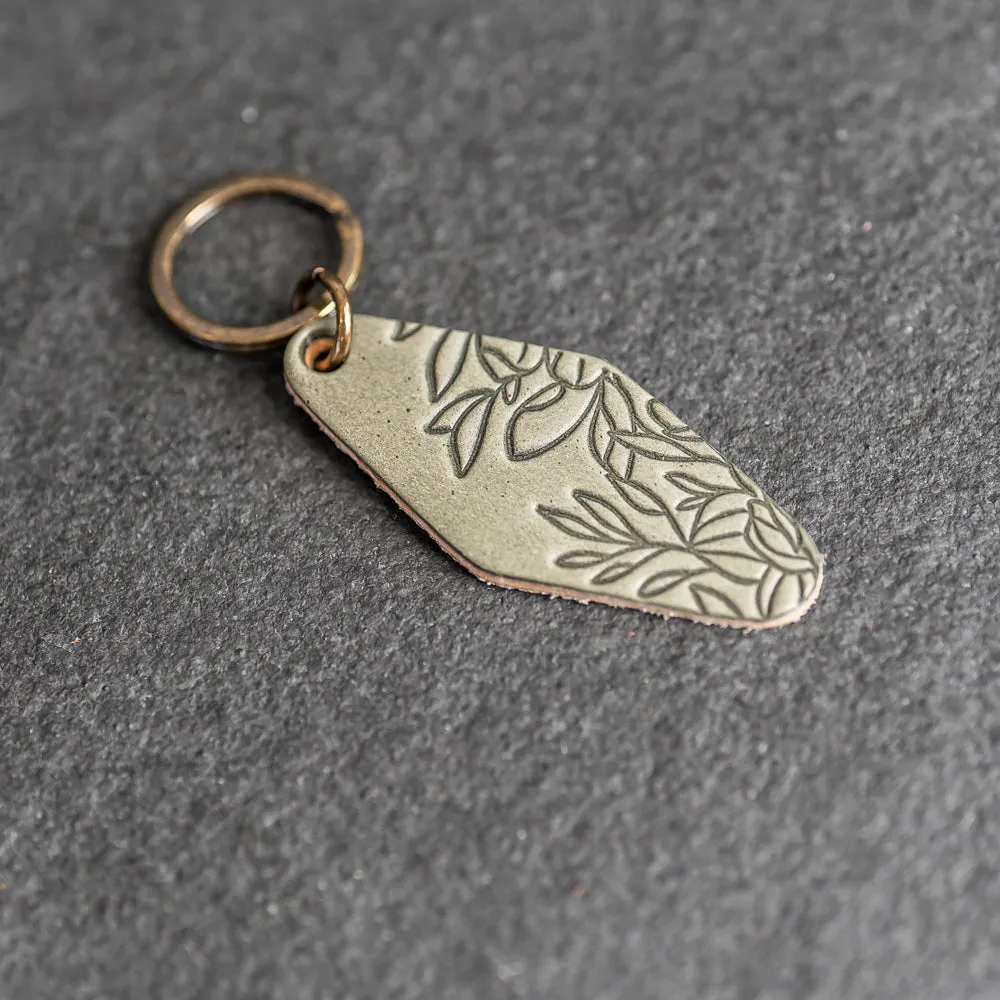 Leather Motel Key Shape Keychain with Floral Stamp Design