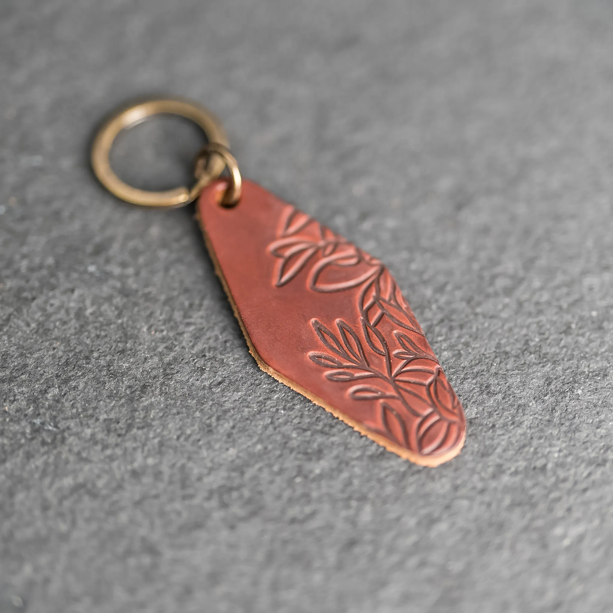 Leather Motel Key Shape Keychain with Floral Stamp Design