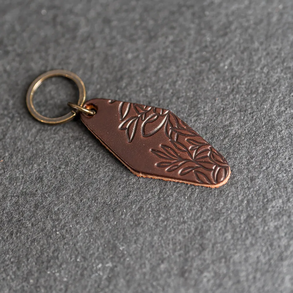 Leather Motel Key Shape Keychain with Floral Stamp Design