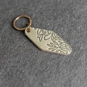 Leather Motel Key Shape Keychain with Floral Stamp Design