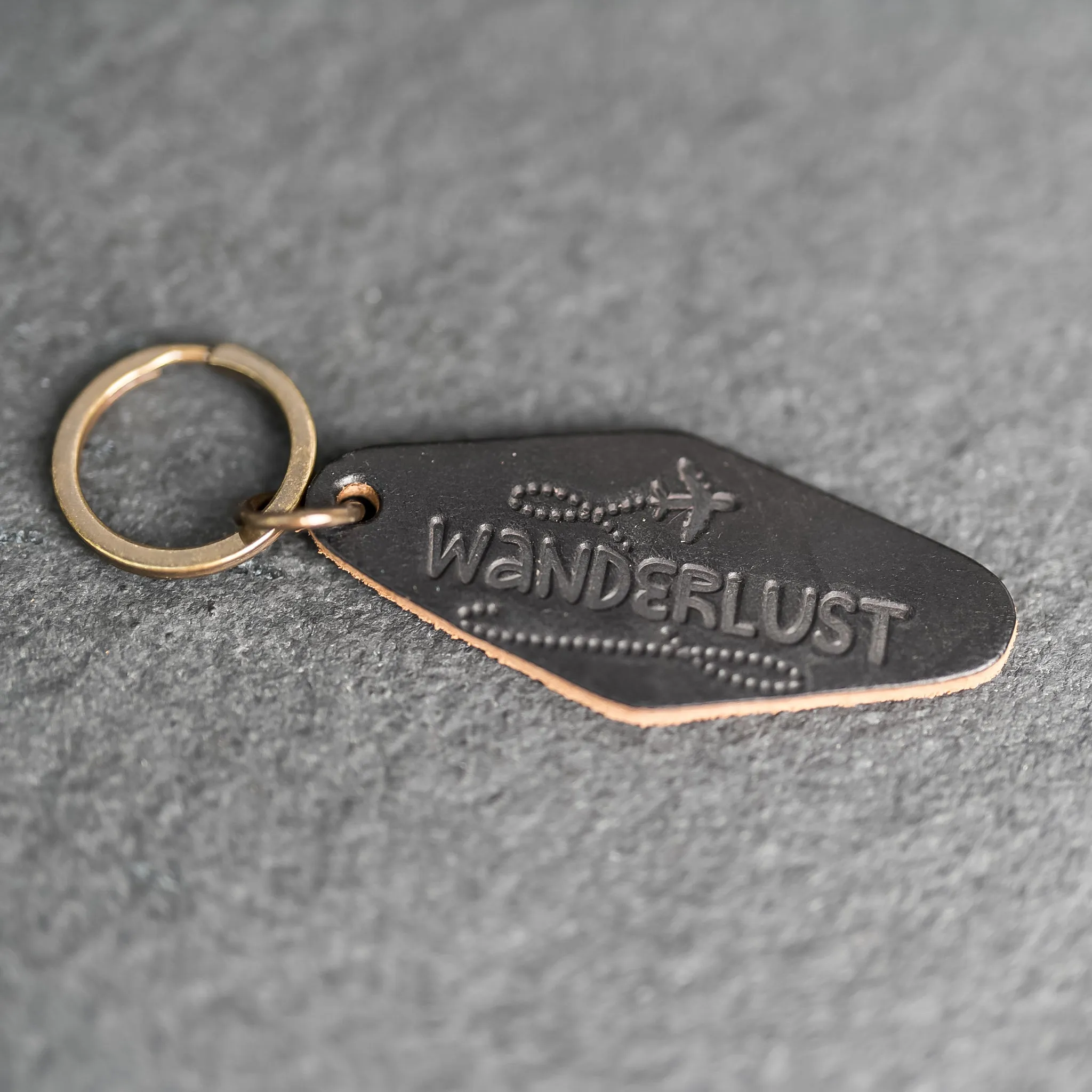 Leather Motel Key Shape Keychain with Wanderlust Stamp Design