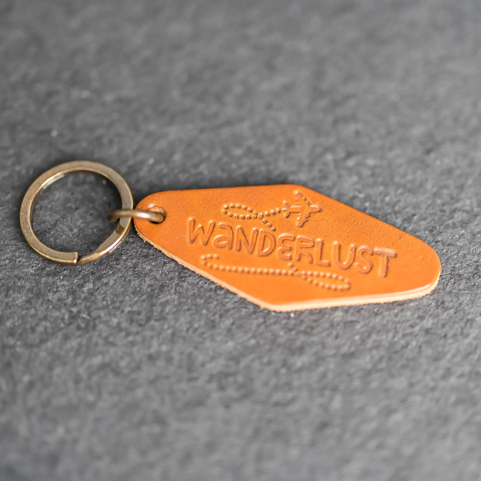 Leather Motel Key Shape Keychain with Wanderlust Stamp Design